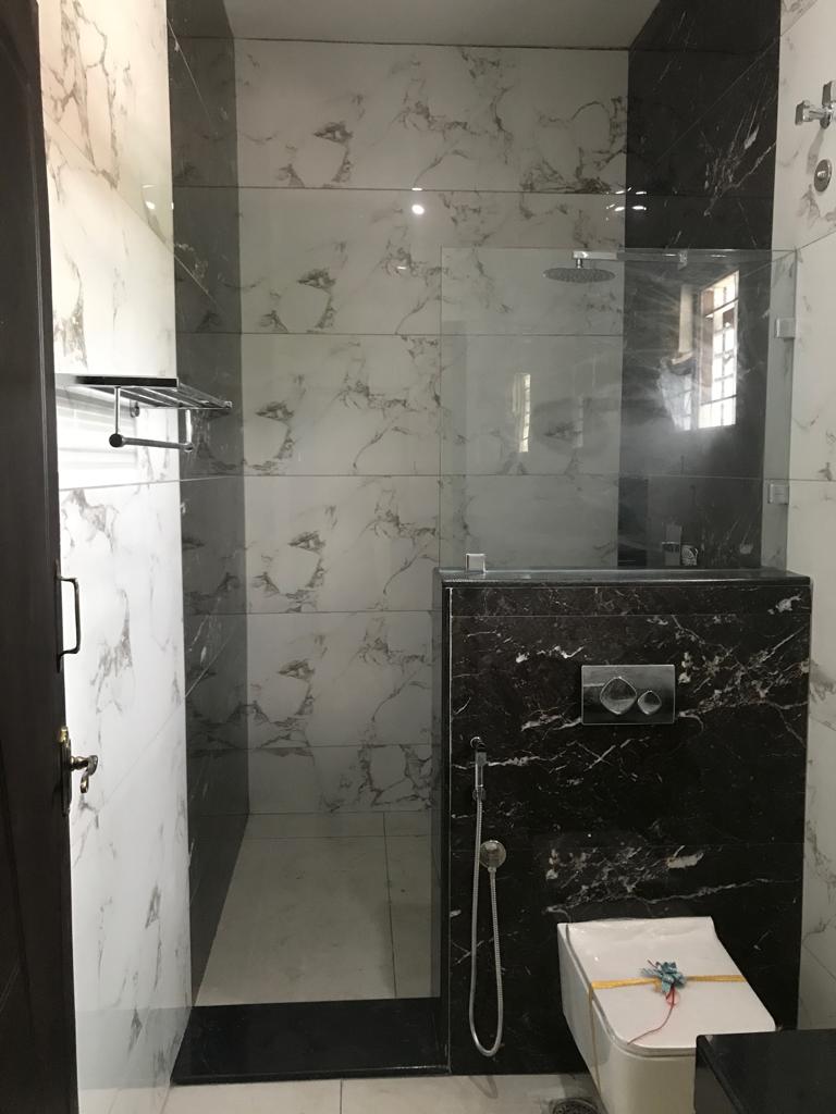 black and white bathroom tiles in Coimbatore